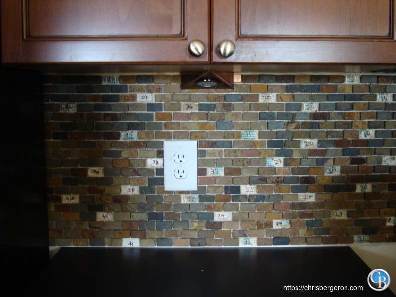 Backsplash before touch activated tiles